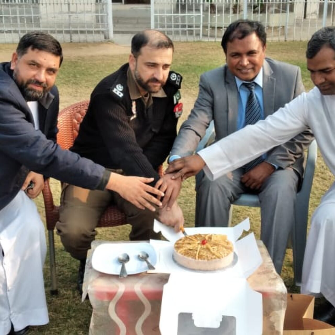 A Christmas Cake celebration with the Superintendent of Police Gujranwala
