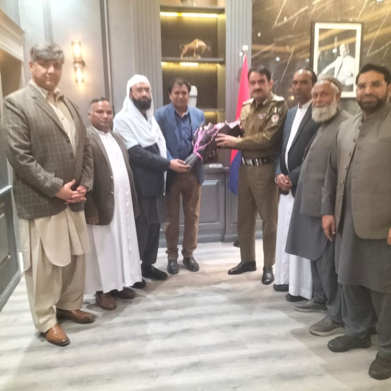 I and religious leaders presented flowers to the City Police Officer