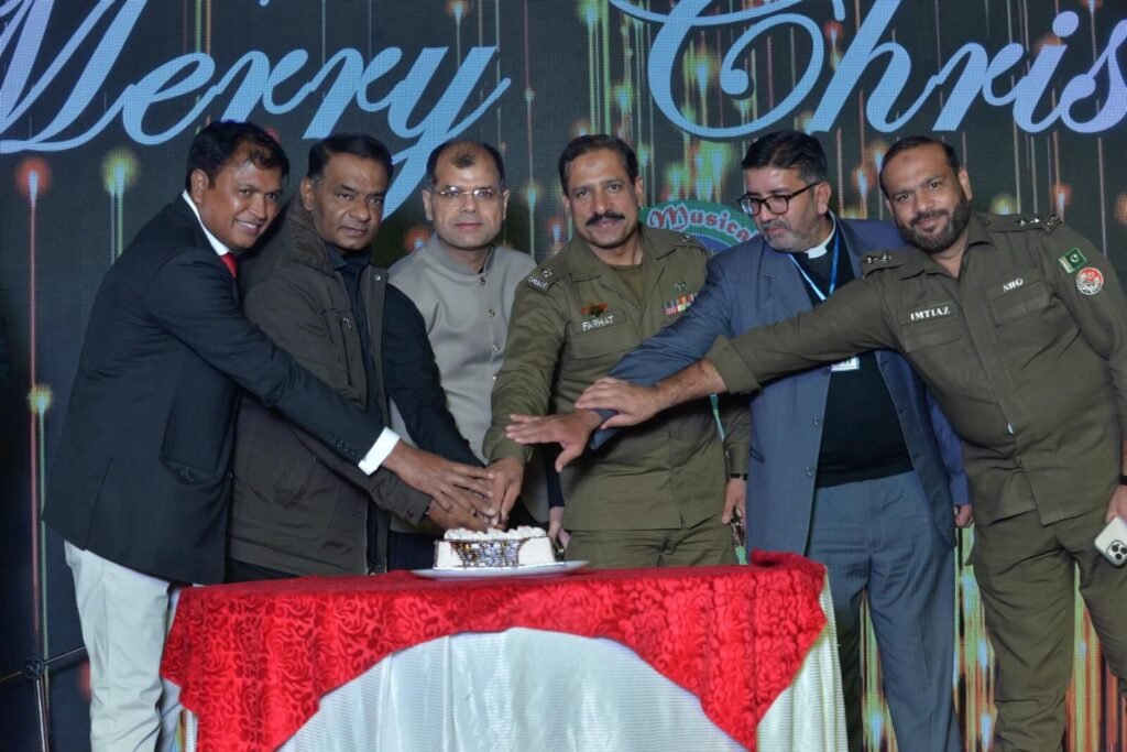 Cake cutting the Christmas Musical Evening Program