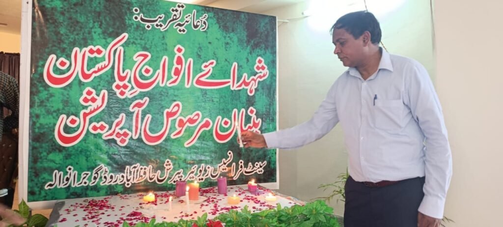 Mr. Shahzad Lawrence lit the candle in memory of the martyrs