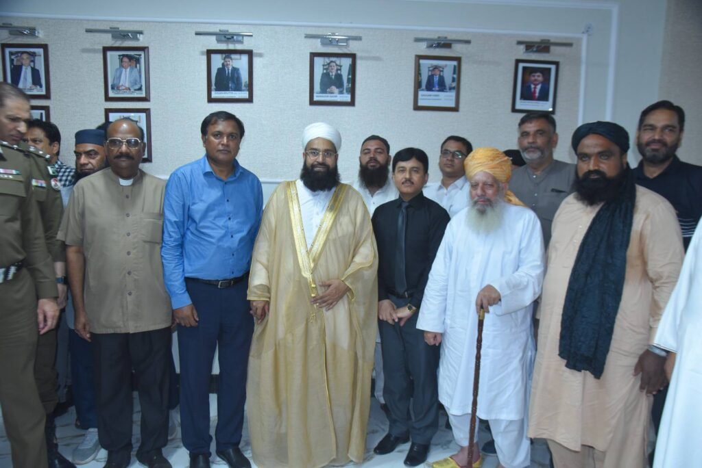 A group picture was captured with Hafiz Tahir Ashrafi