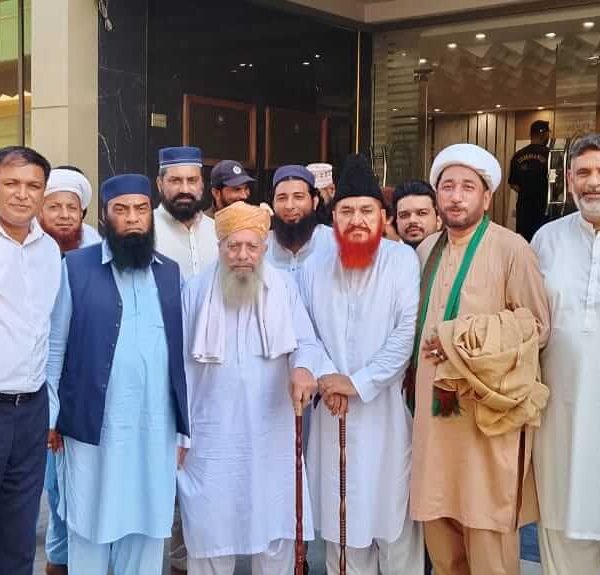 A picture with religious leaders at Commerce office, Gujranwala.