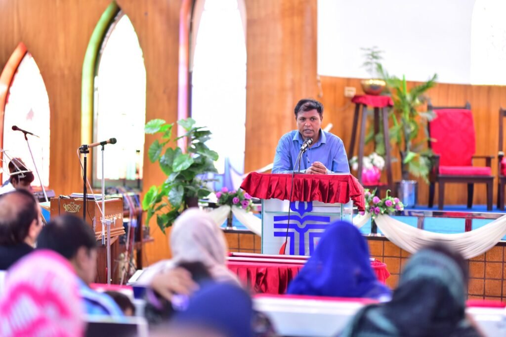Mr. Shahzad Lawrence is addressing the parishioners