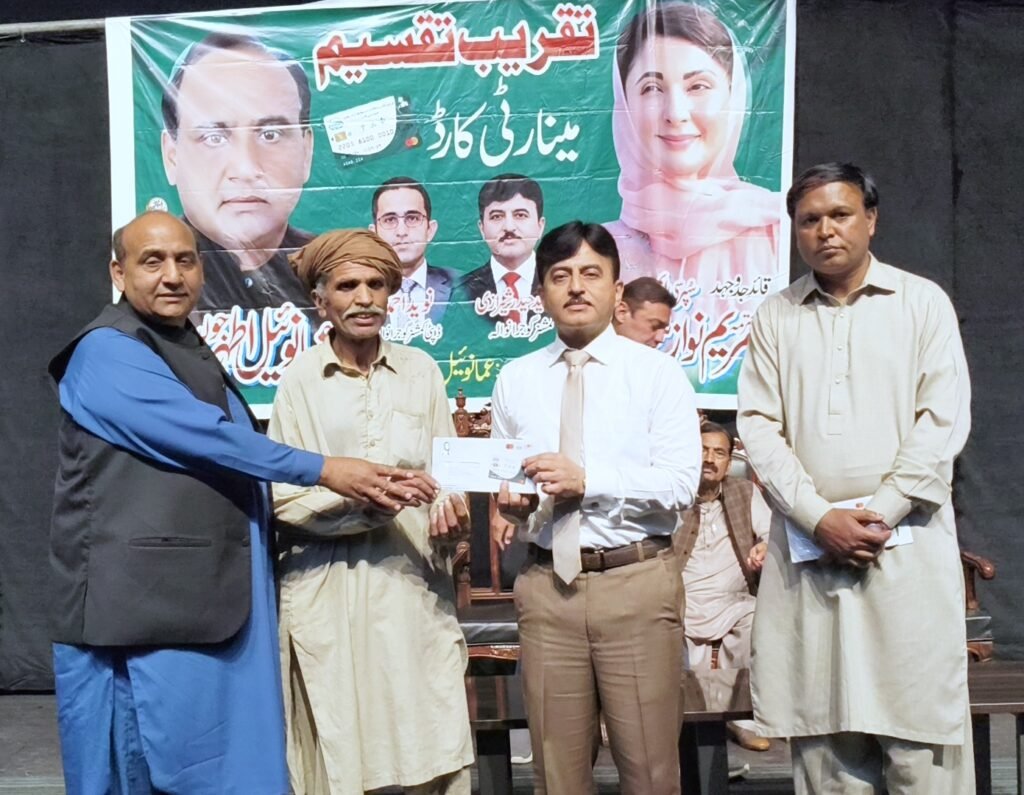 Worthy Naveed Haider Sherazi and Emmanuel Julius were distributing the minority cheques.
