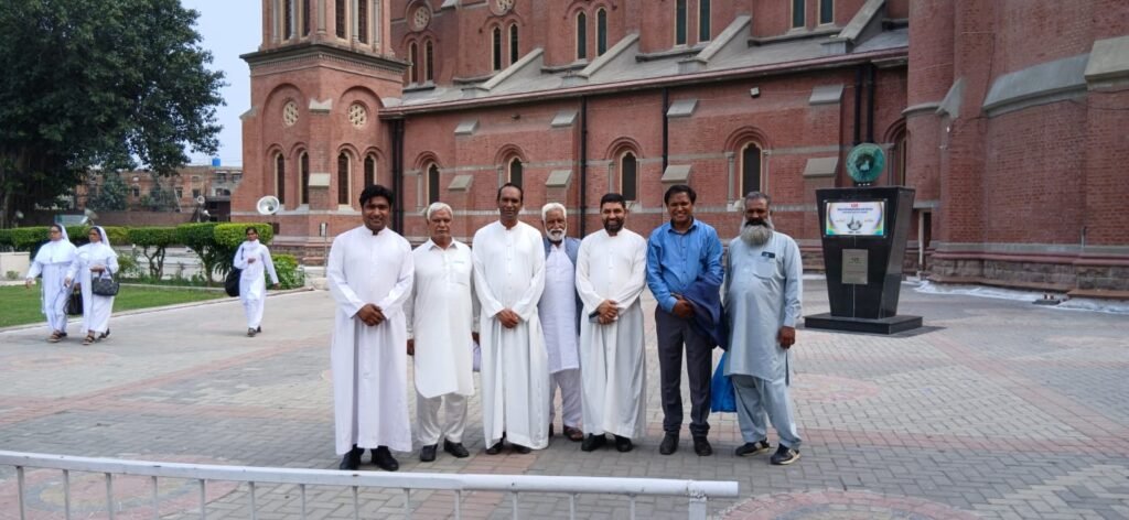 A photo with Rev. Fr. Yousaf Masih, Rev. Fr. Zafar Tanveer, and Deacon Arslan