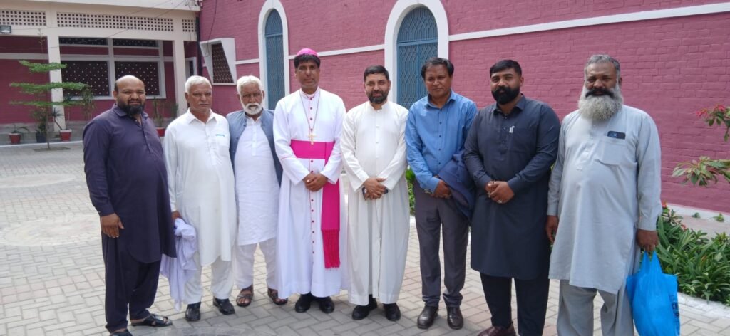 His Excellency Archbishop Khalid Rehmat, Rev. Fr. Yousaf Masih with parishioners.