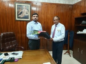 Shahzad Lawrence presenting flowers to Mr. Shaheryar Habib, ADC HC